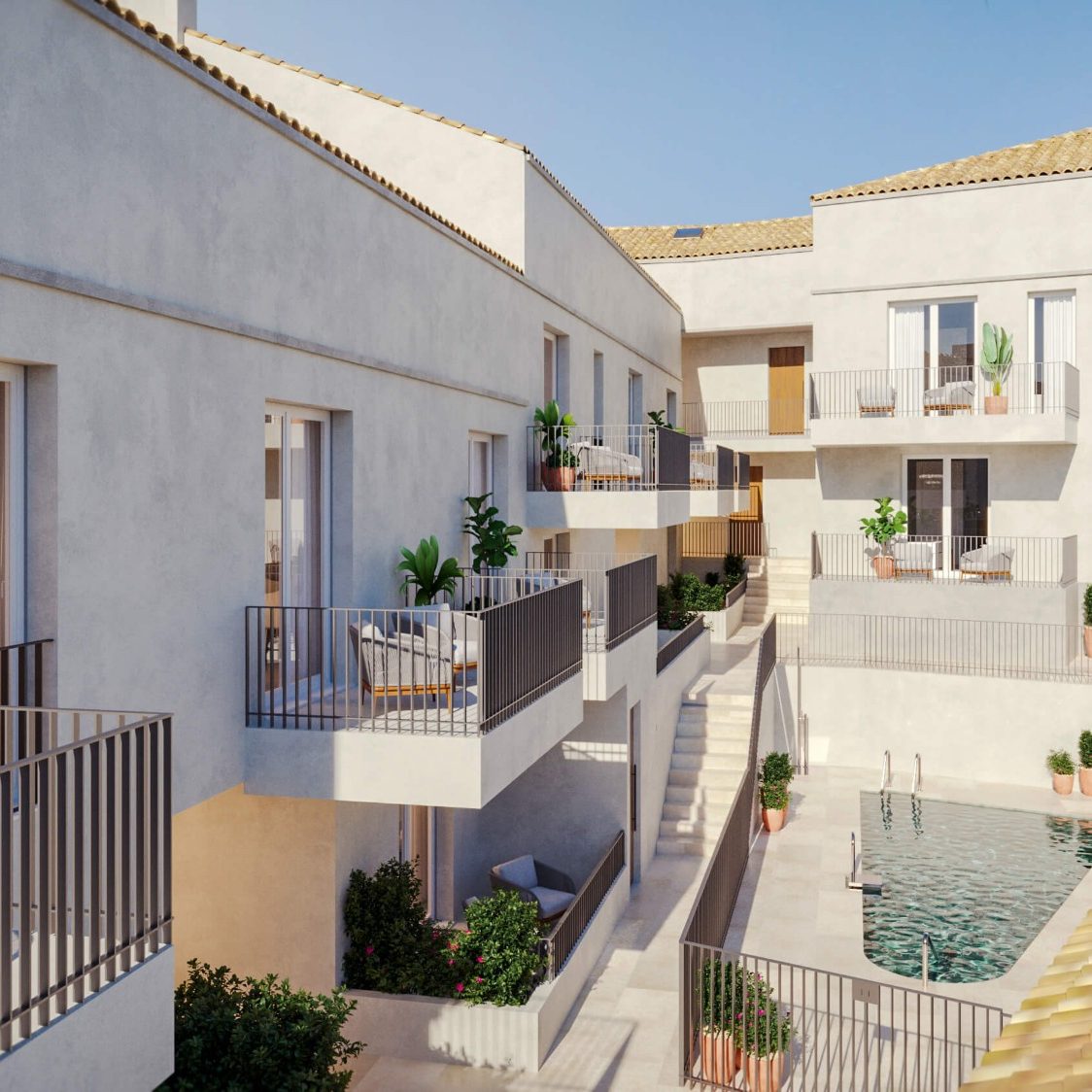 Piscina comunitaria y terrazas privadas en la promoción Ermita 44, Pizarra, Málaga